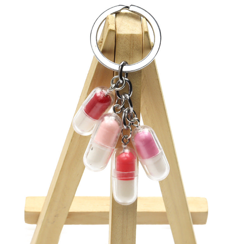 Wholesale Acrylic Cute Smiley Face Capsule Pendant Keychain